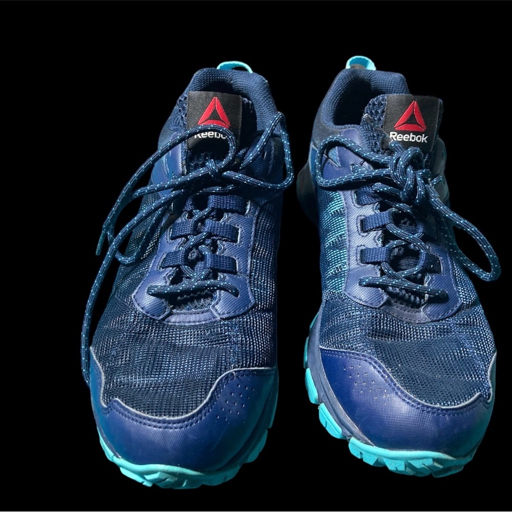 Bright blue and aqua Reebok running shoes. Size 9.5 US.